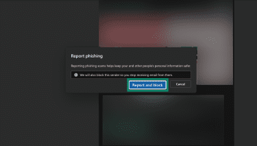 The "Report phishing" pop-up in Outlook, highlighting the "Report and Block" button.